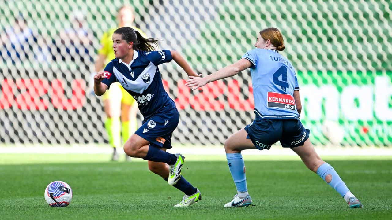 Melbourne Victory's Rachel Lowe (left) in action v Sydney FC.