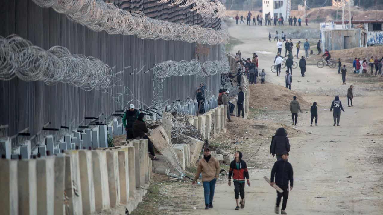 Displaced Palestinians at the Rafah camp, near the Egyptian border