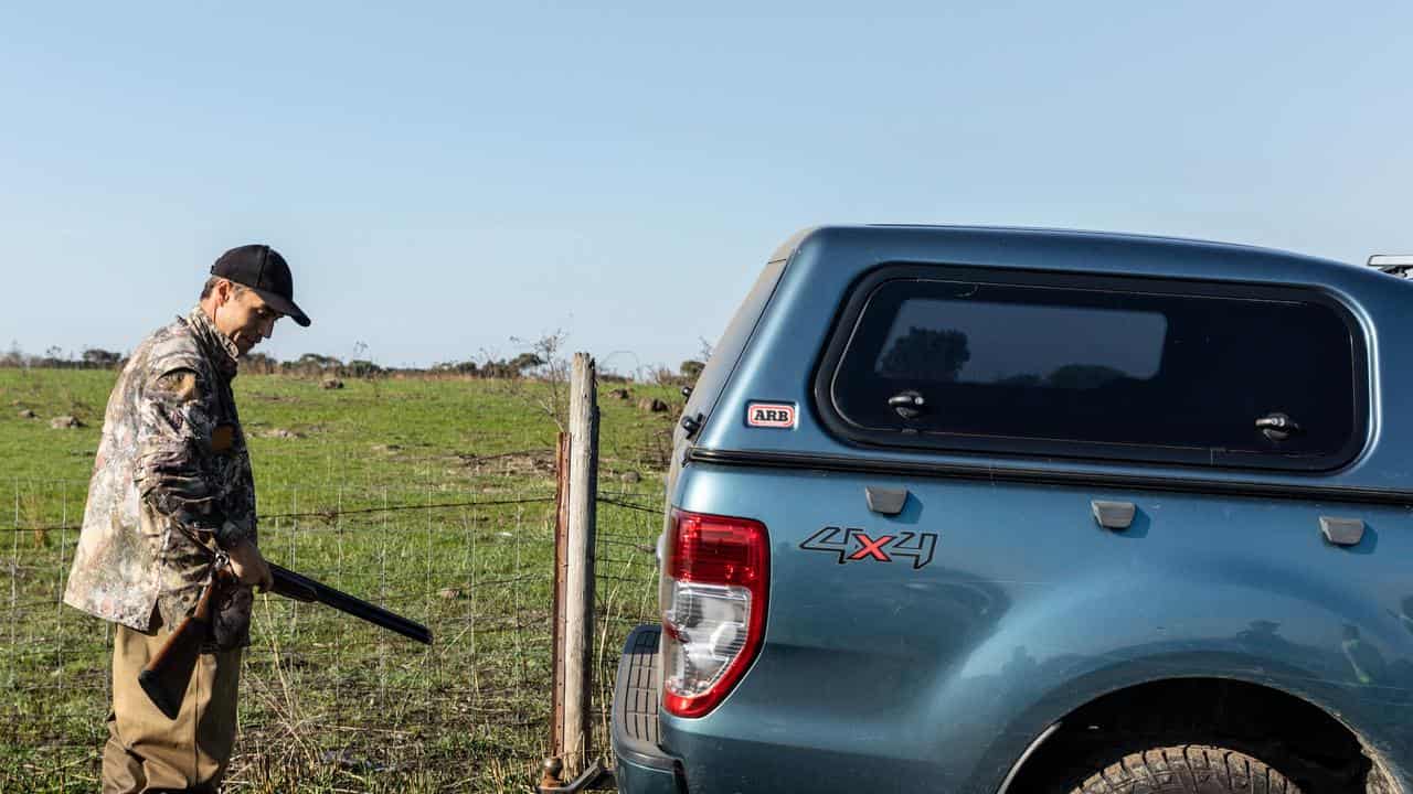 Tony Ortega is seen back at his car after hunting ducks