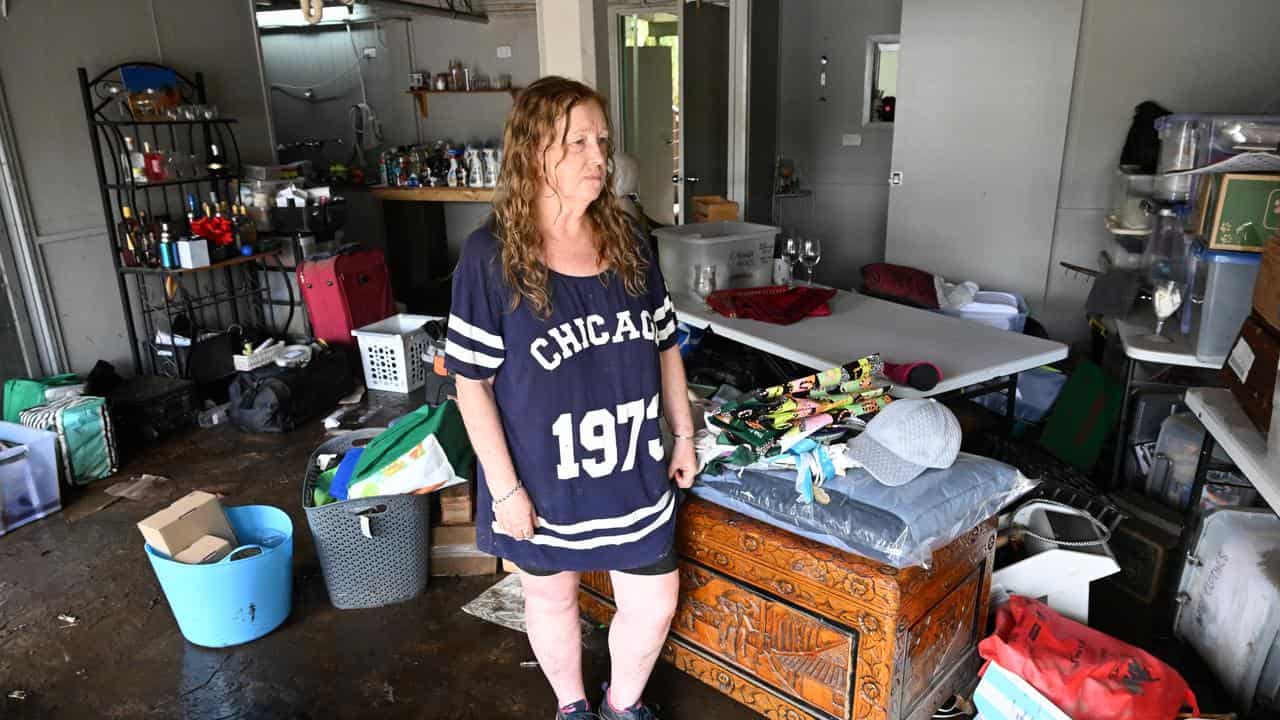 Madeleine Higgs in flooded home