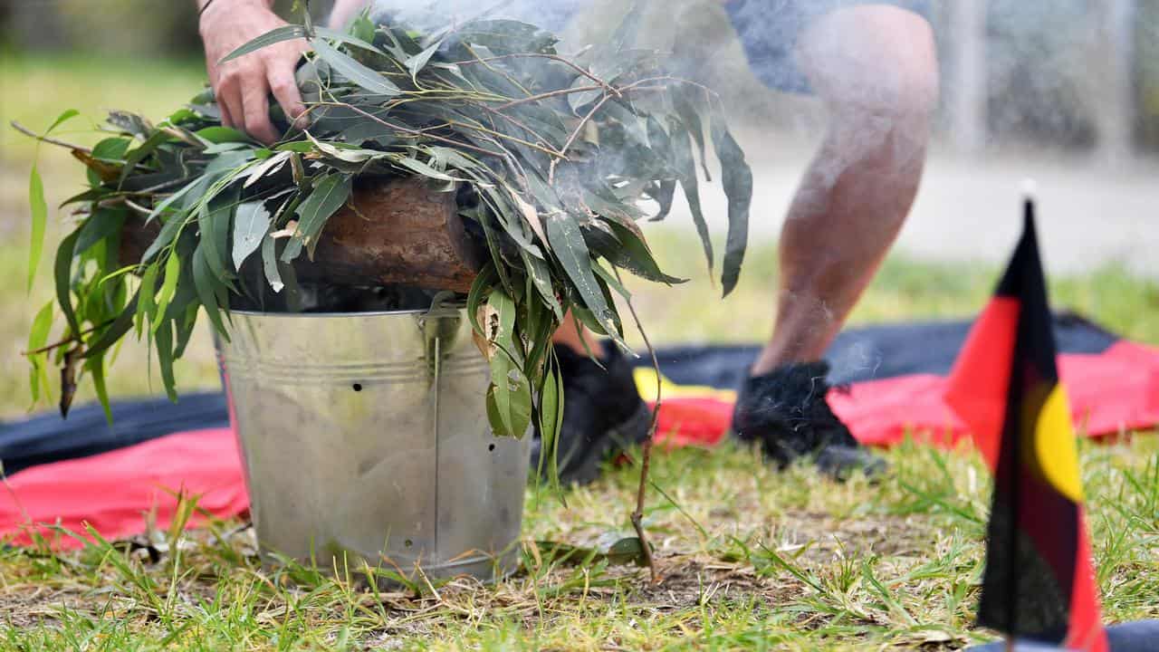 Smoking ceremony before the inquest findings on Timothy Garner's death