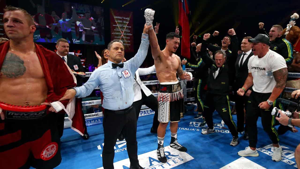 Jai Opetaia celebrates beating Mairis Briedis.