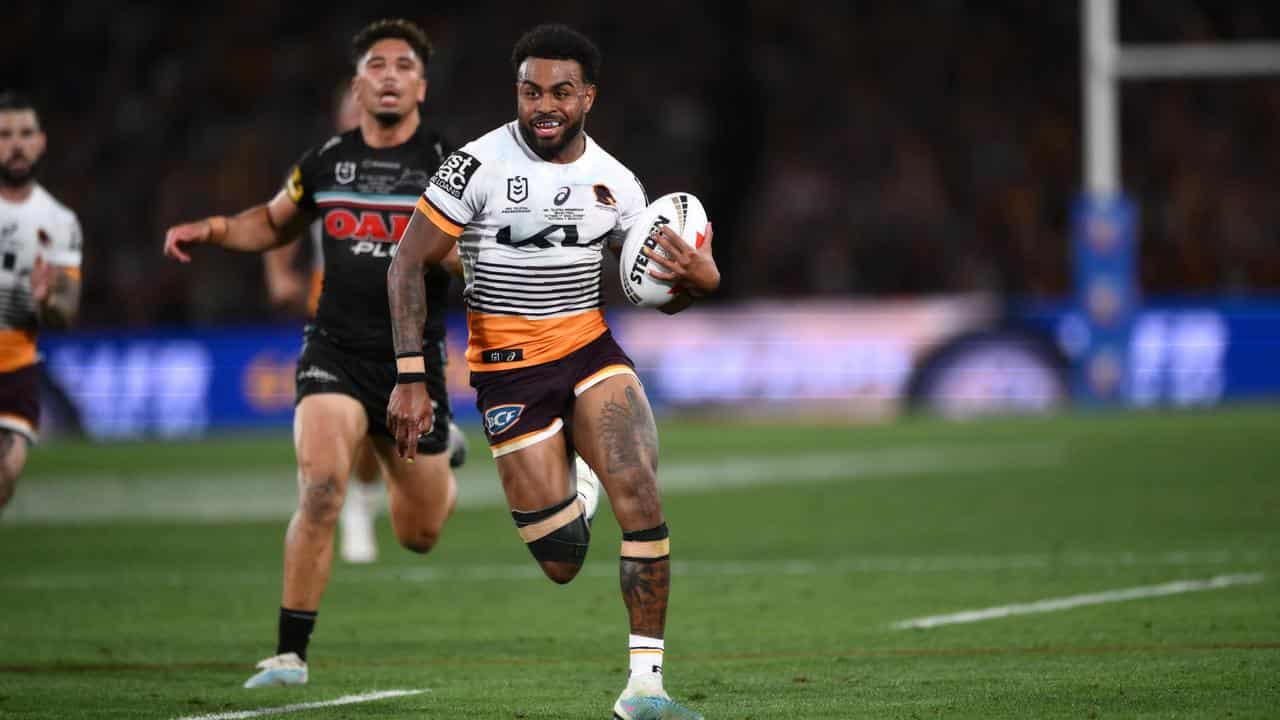 Brisbane's Ezra Mam runs with the ball in the NRL grand final in 2023.