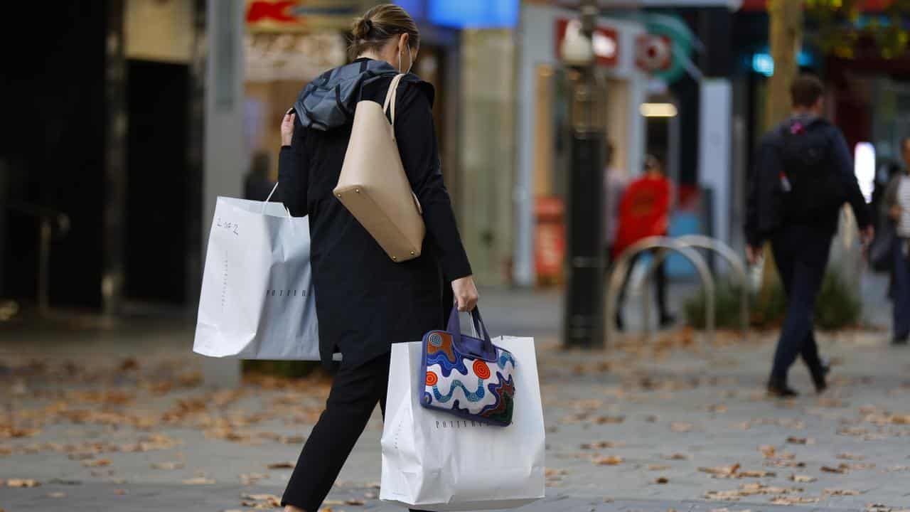 A woman in a shopping area.