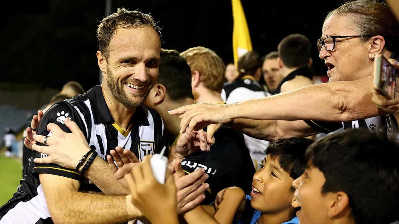 Macarthur player Valere Germain celebrates his late goal against WSW.