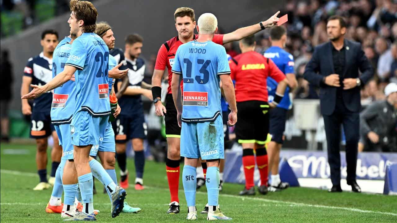 Sydney FC's Patrick Wood is sent off against Victory. 