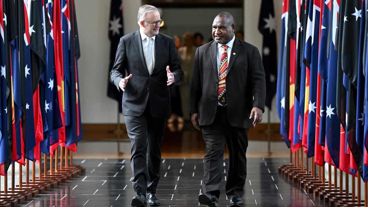 Anthony Albanese escorted James Marape.