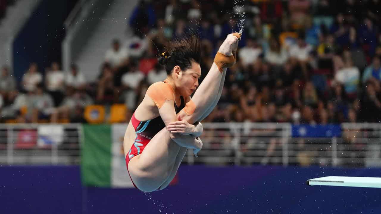 Yani Chang dives to gold