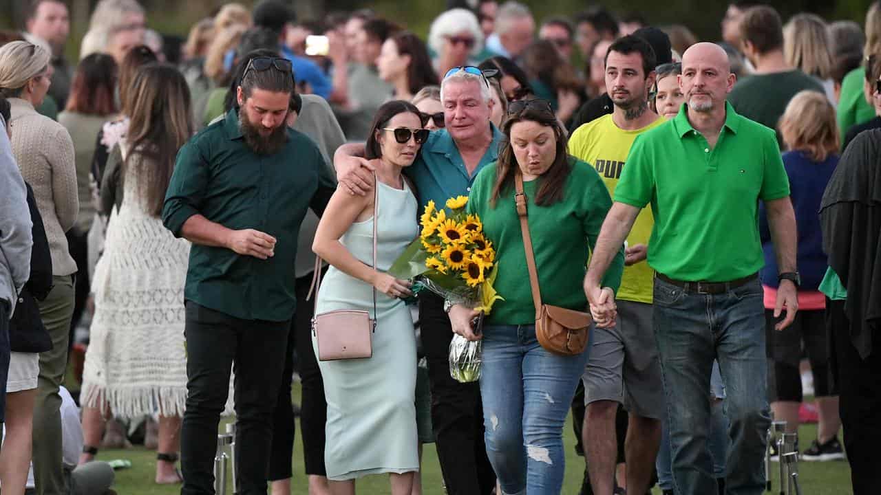 The family of Kelly Wilkinson depart a vigil (file image)