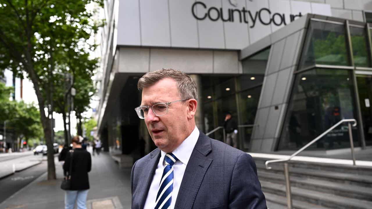 Alan Tudge leaves the County Court (file image)