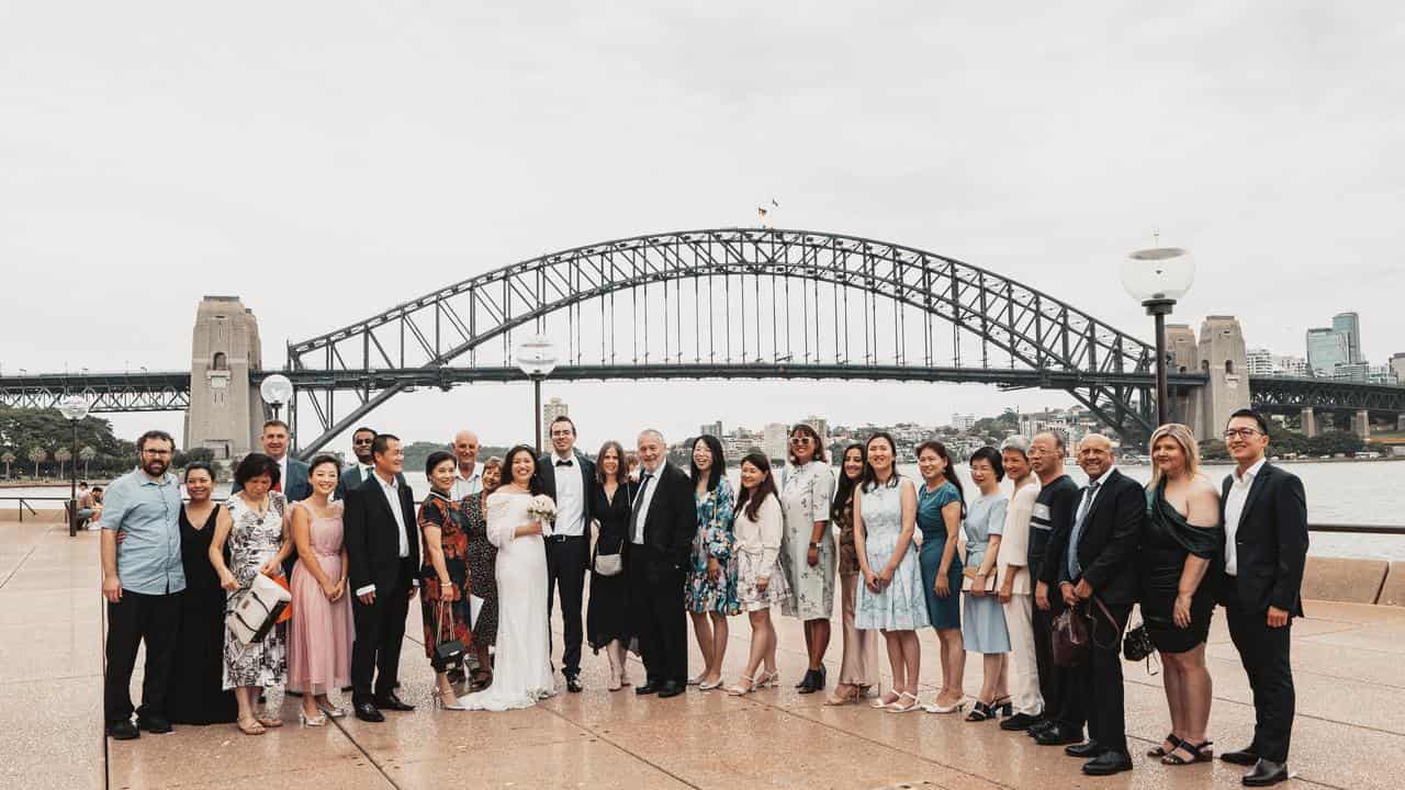 Wedding party in front of Sydney Harbour Bridge