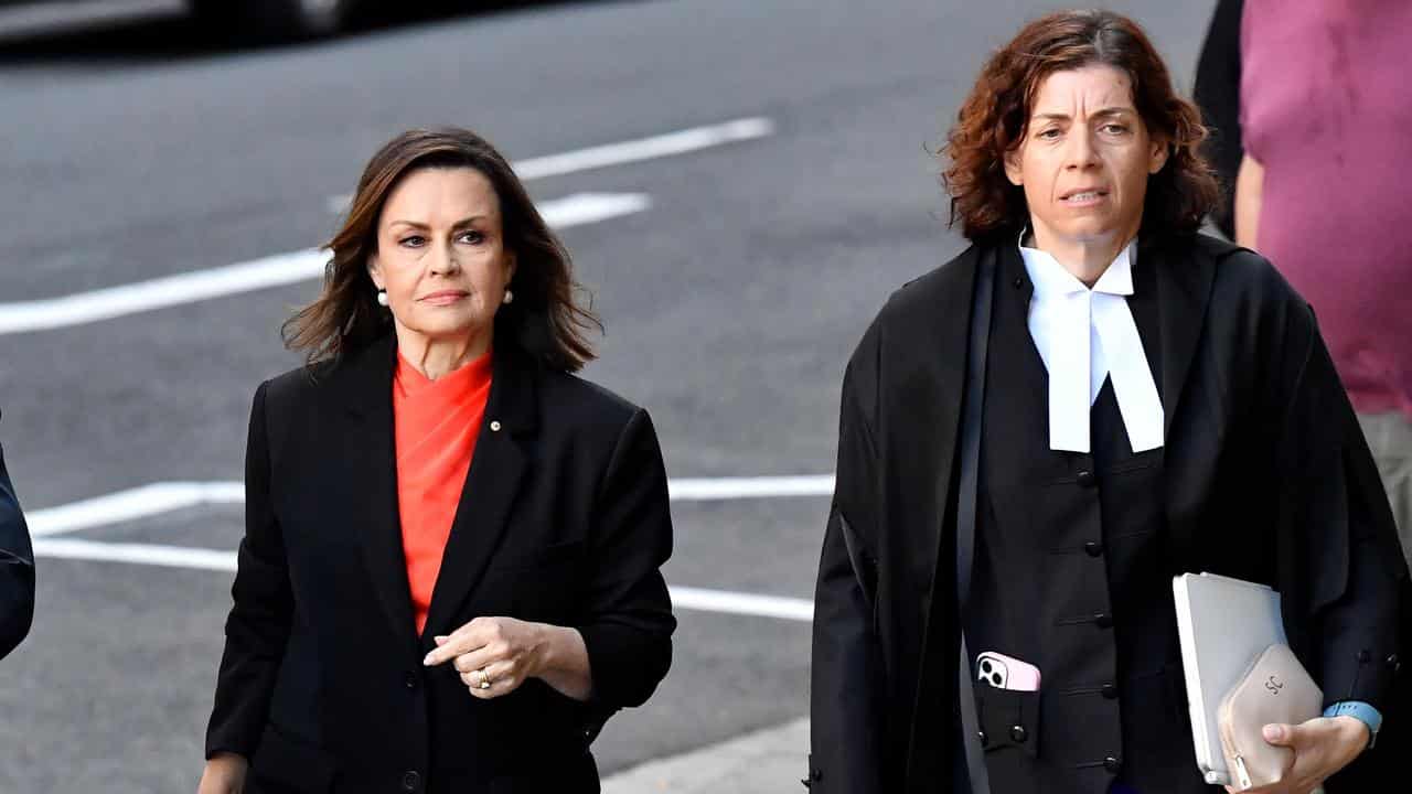 Lisa Wilkinson and Sue Crysanthou outside court