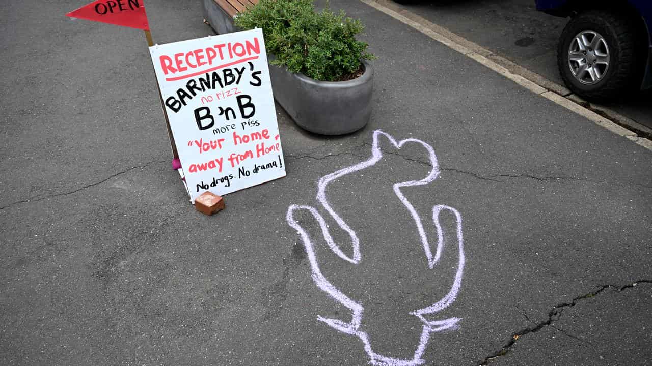 An outline next to a planter box where Barnaby Joyce was filmed.