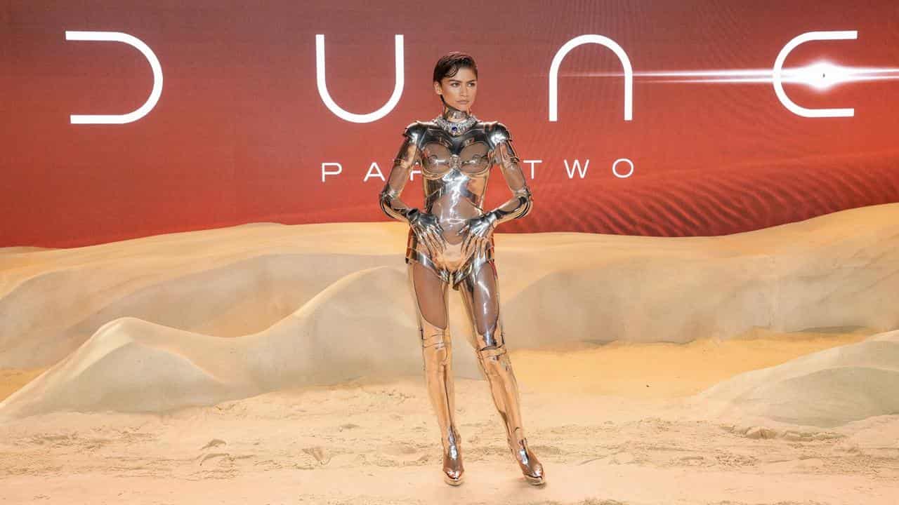 Zendaya poses for photos at the Dune: Part Two world premiere.