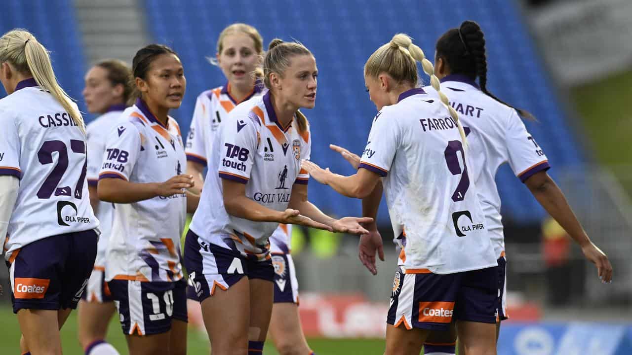 Perth Glory celebrate a goal in the A-League Women.