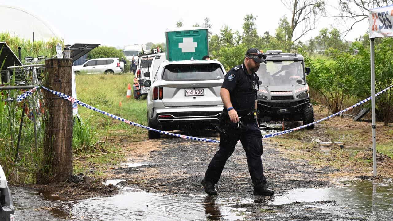 Vehicles seized from Queensland farm in murder investigation.