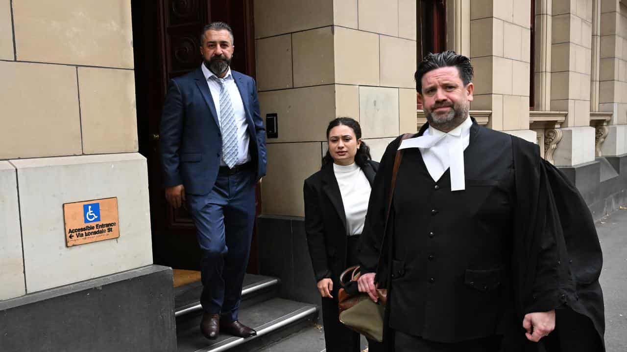 Laith Hanna (left) departs from the Supreme Court