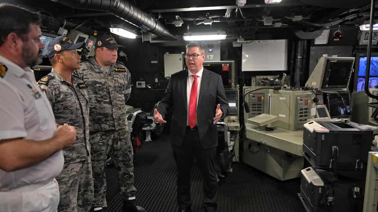 Defence Industry minister Sen Pat Conroy on HMAS Sydney DDG 