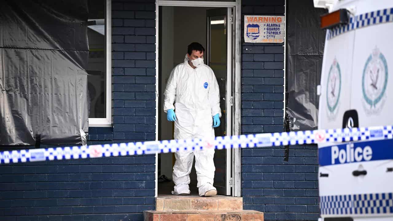 A child and a woman have been found dead at a martial arts centre.