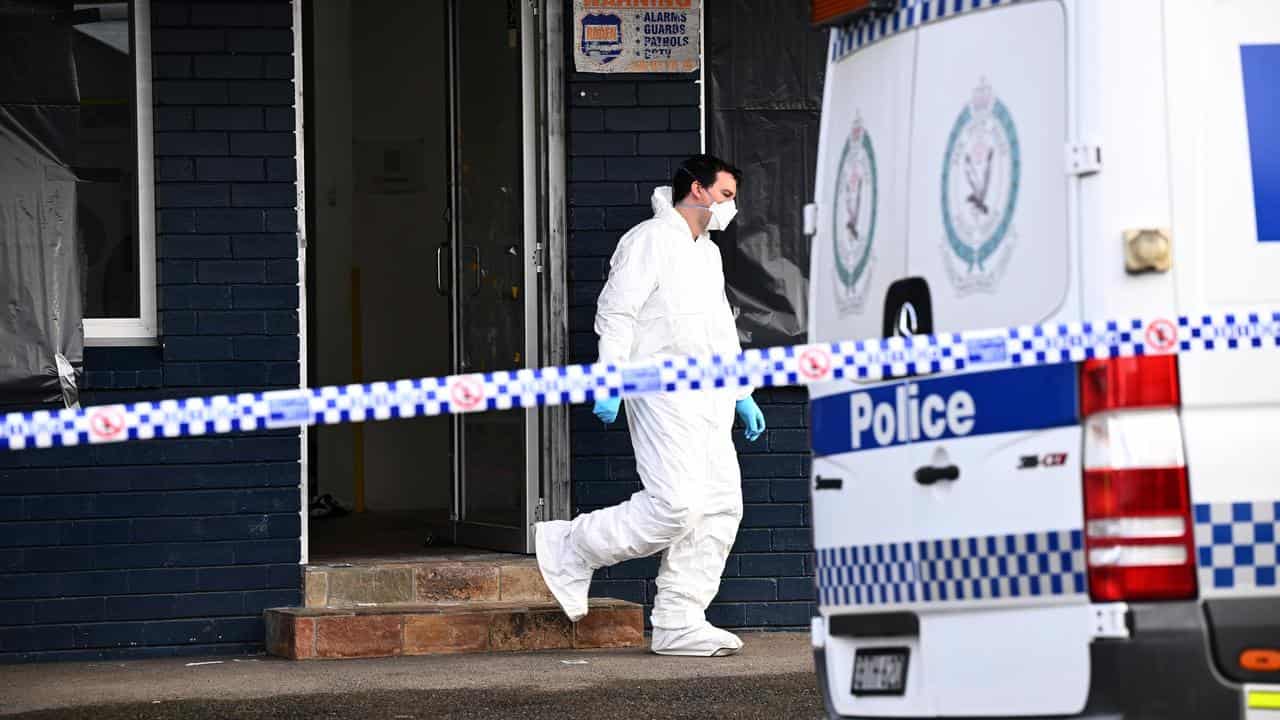 Forensics officer at the North Parramatta crime scene