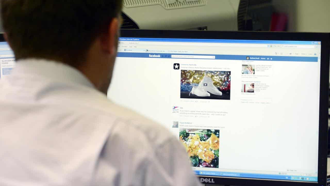 A man uses a desktop computer (file image)