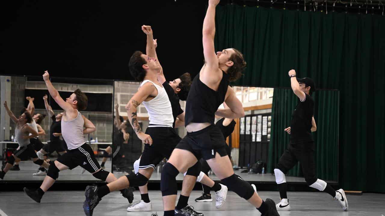 Ensemble performers rehearse for West Side Story.