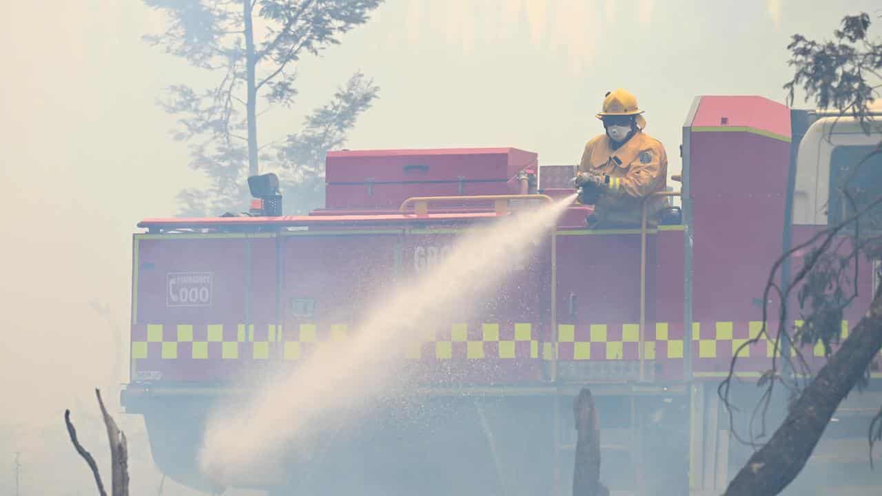 A CFA strike team defends a property near Raglan in Victoria.