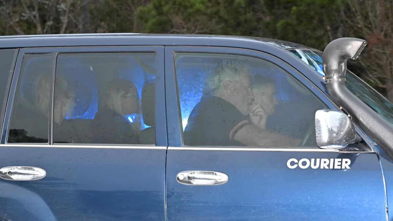 Family members arrive at a property in Bungonia.