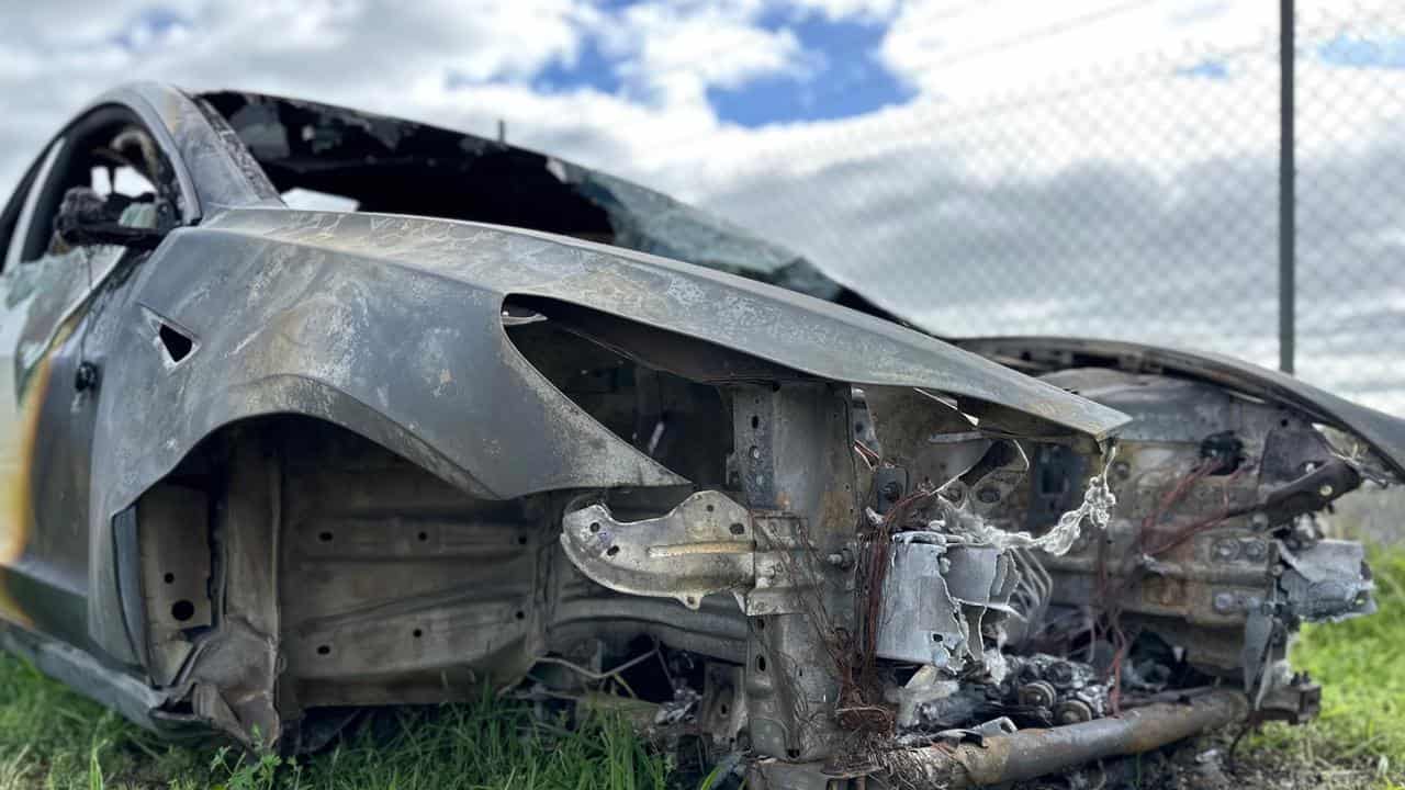 Burnt remains of a Tesla Model 3