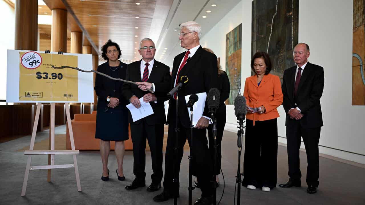 BOB KATTER COLES WOOLWORTHS PRESSER