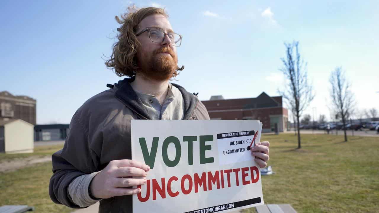 A "Vote Uncommitted" sign at a voting station in Dearborn, Michigan