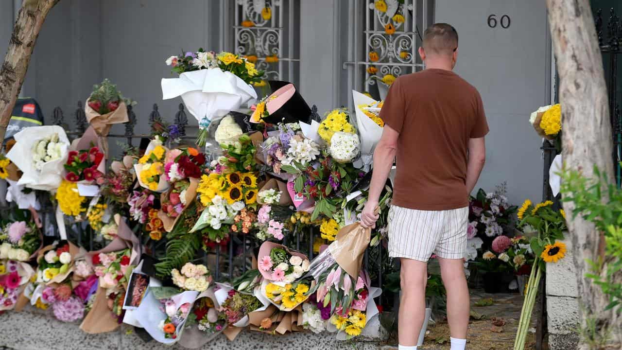 Floral tributes for Jesse Baird and Luke Davies.