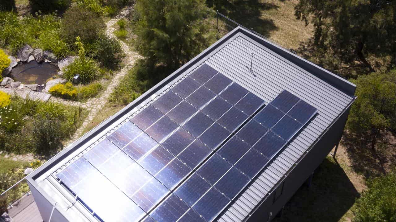 House with rooftop solar panels