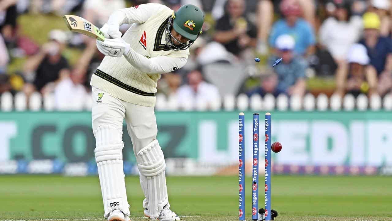 Usman Khawaja is bowled by New Zealand's Matt Henry for 33.