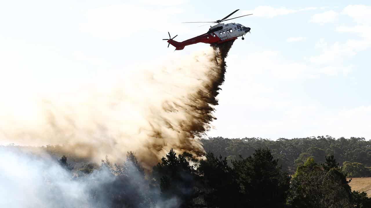 Flames are seen during a spot fire outside of Beaufort, Victoria