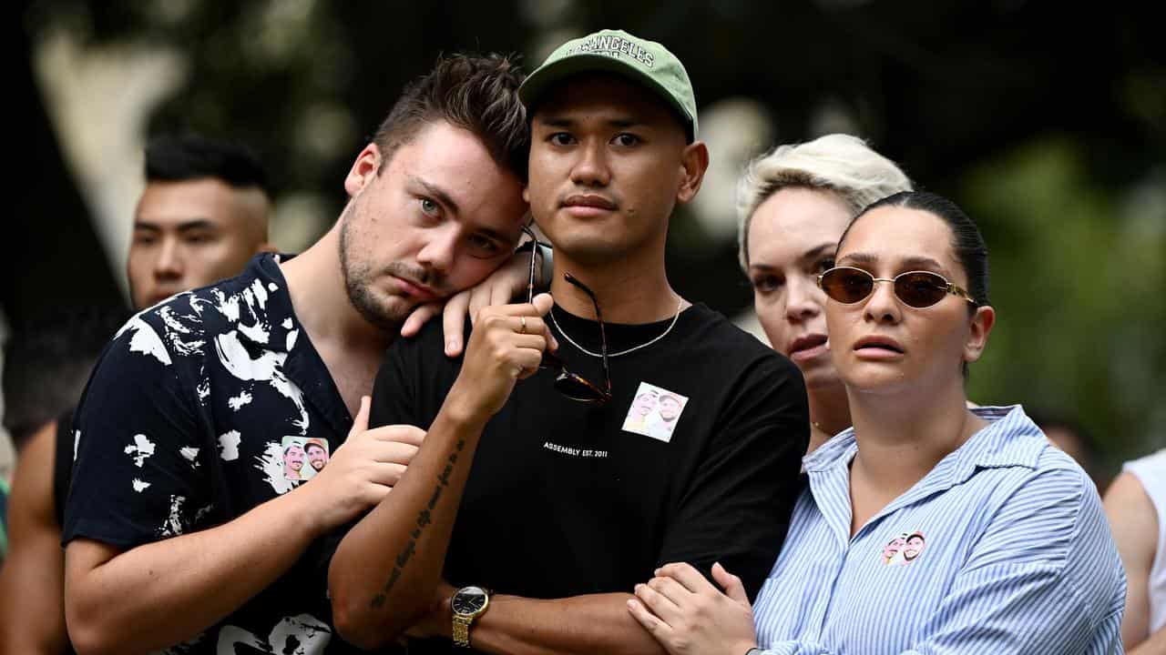 A vigil in Sydney's east for slain couple Luke Davies and Jesse Baird.