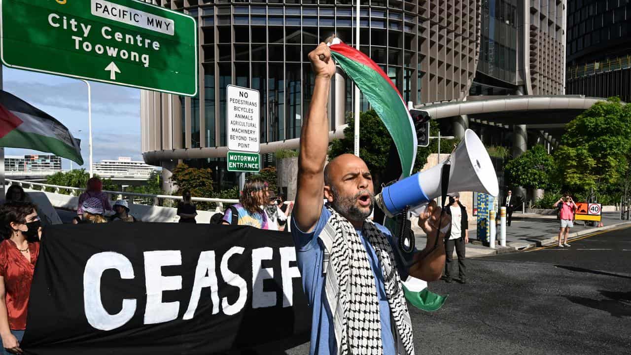 Protesters at a Gaza rally outside Queensland parliament