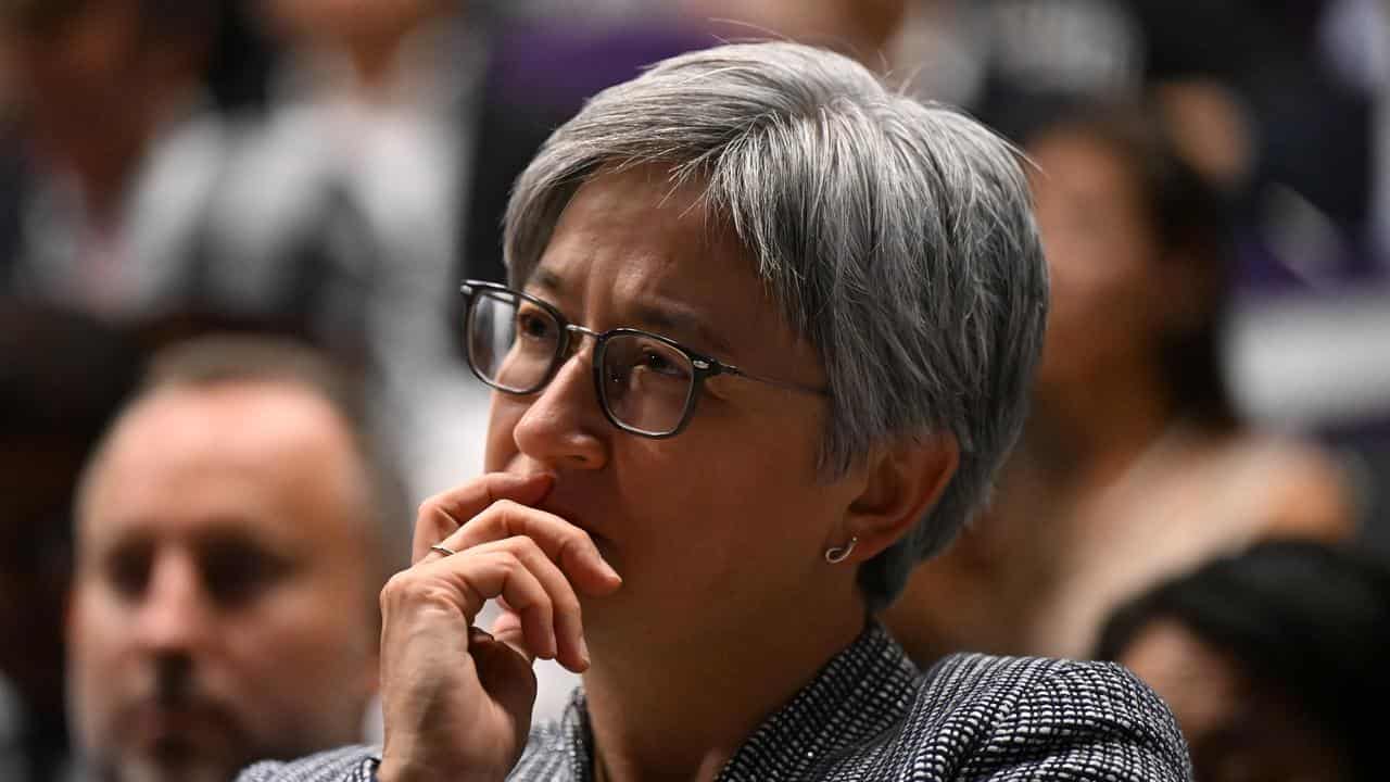 Foreign Minister Penny Wong listens to the Gareth Evans Oration