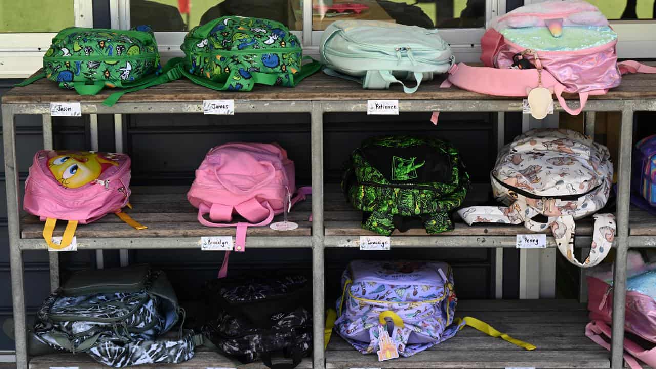 School students' bags in a rack