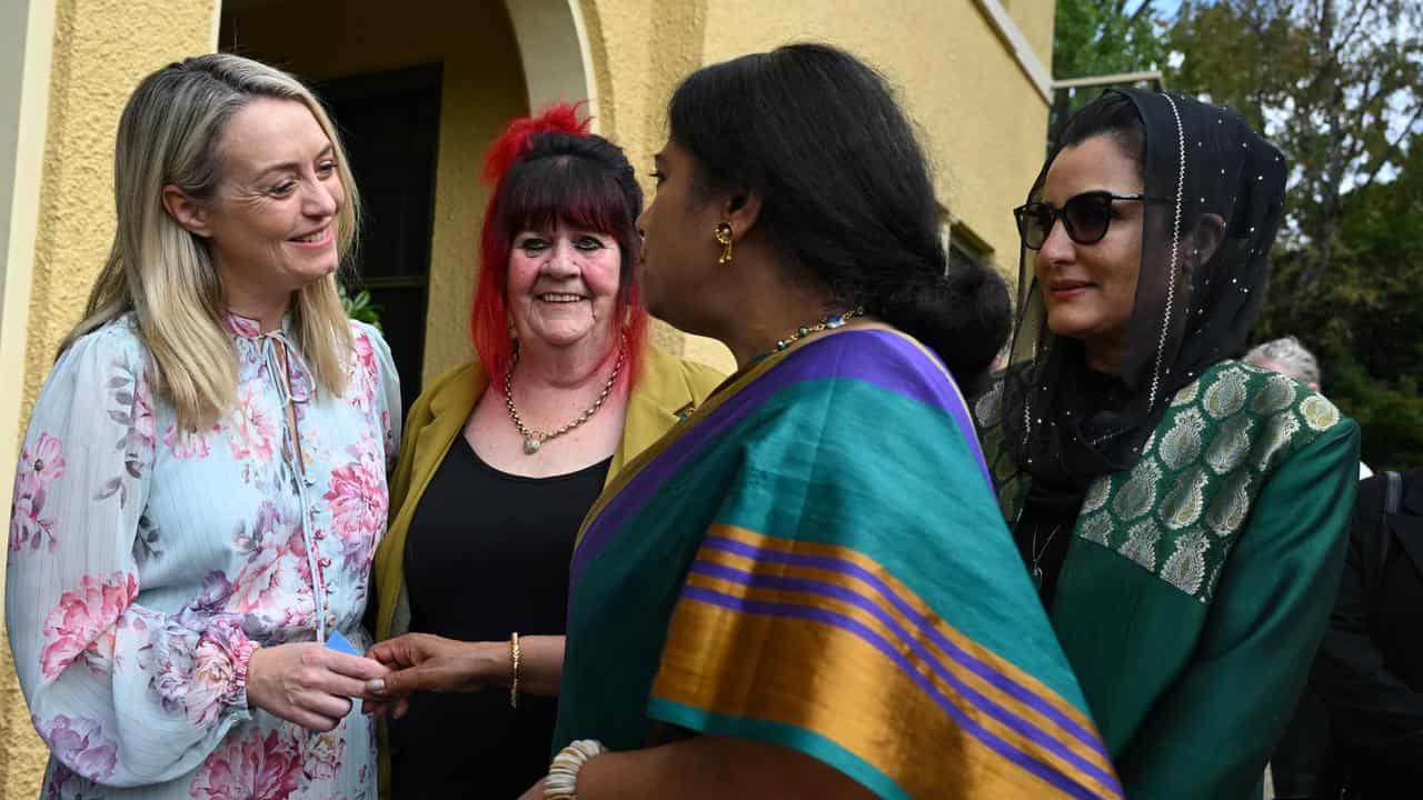 Jodie Haydon with representatives from women's organisations