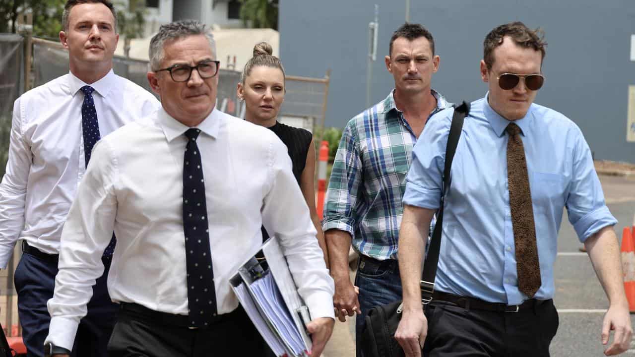 Pilot Michael Burbidge arrives at court with his legal team