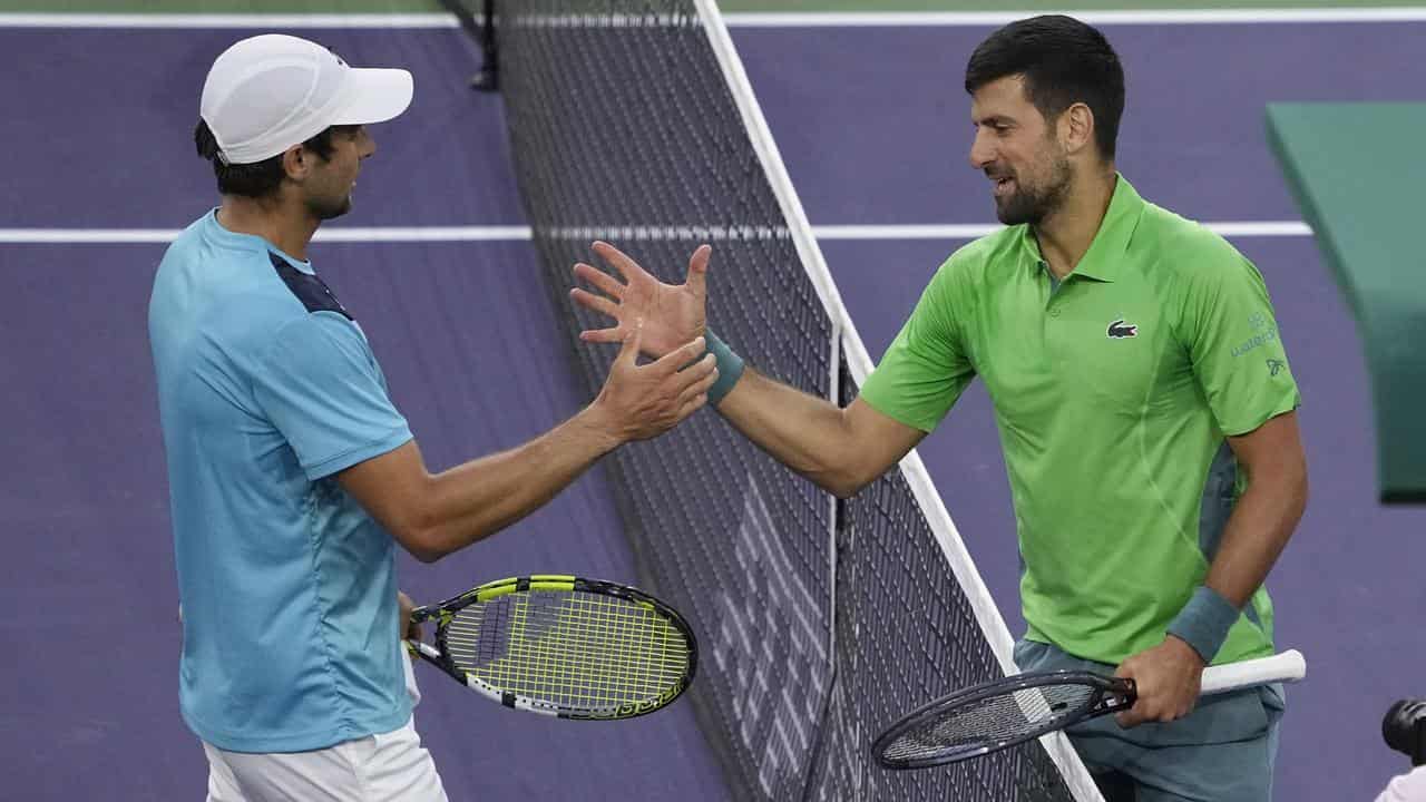 Aleksandar Vukic (left) and Novak Djokovic