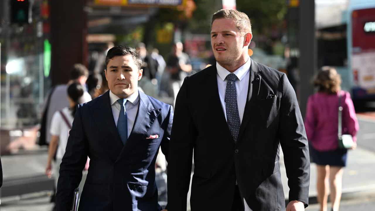 George Burgess (right) arrives at Downing Centre Local Court