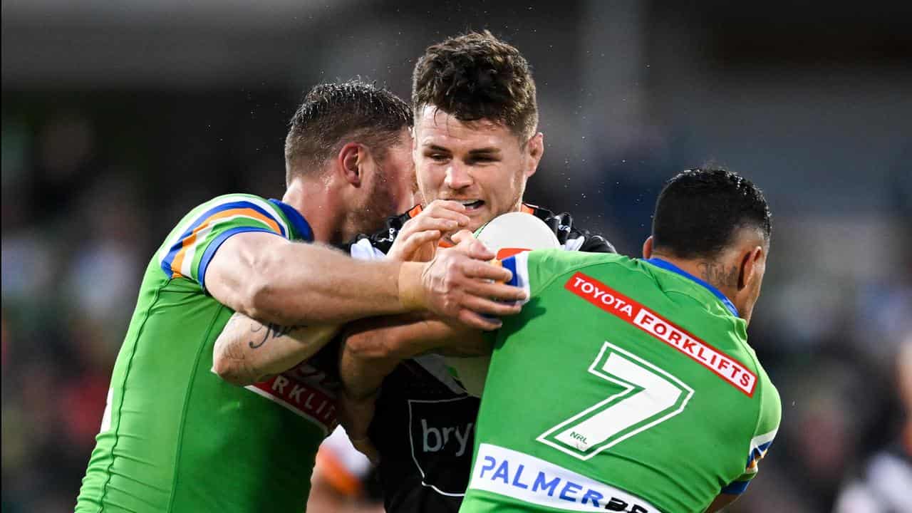 John Bateman of Wests Tigers (centre). 