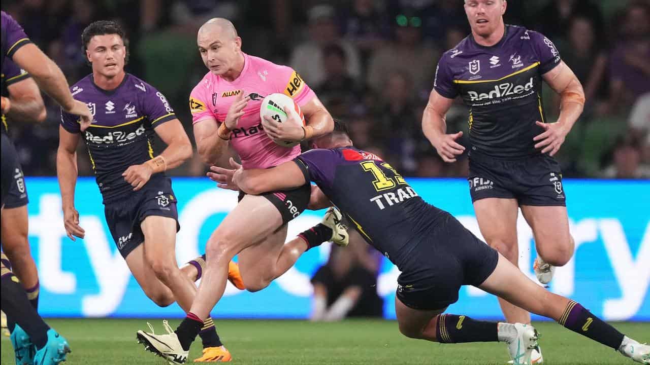 Dylan Edwards of Penrith runs with the ball against Melbourne.