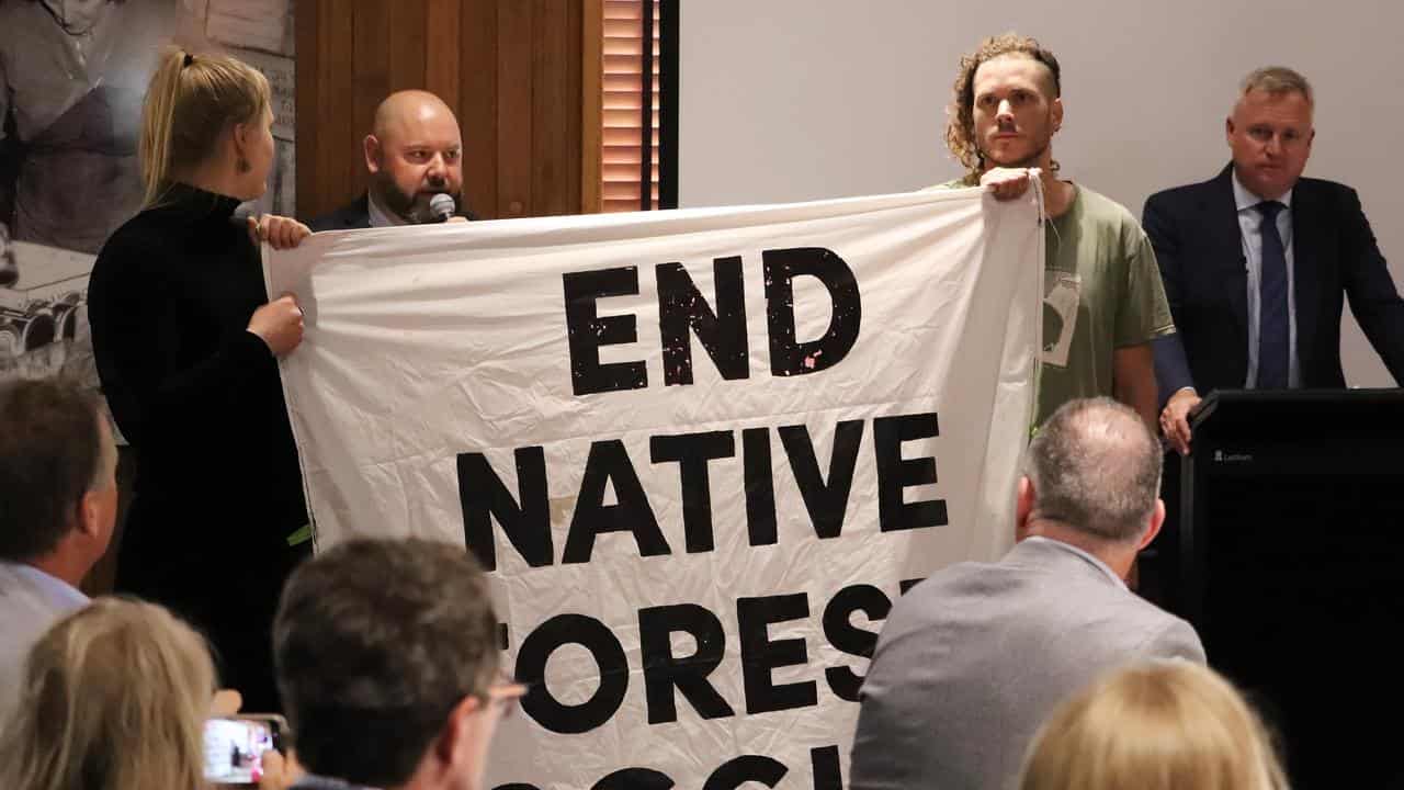 Anti-logging protestors at the leaders' debate in Tasmania.