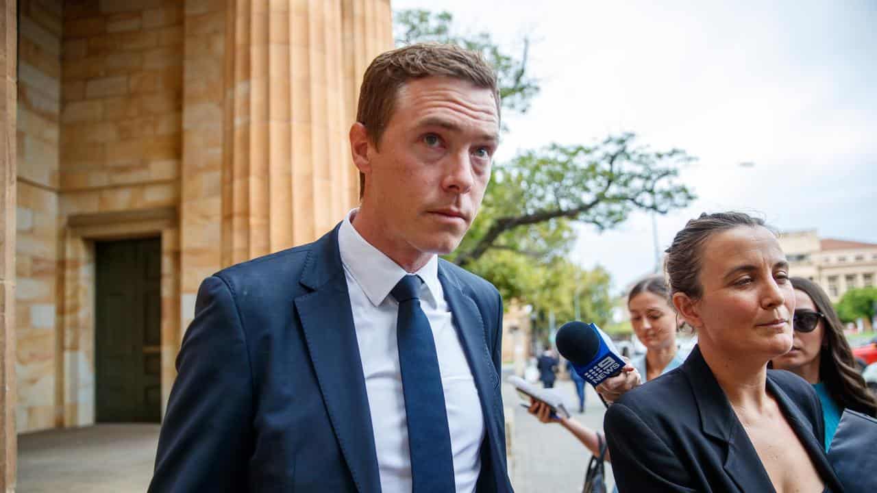 Rohan Dennis arrives at Adelaide Magistrates Court