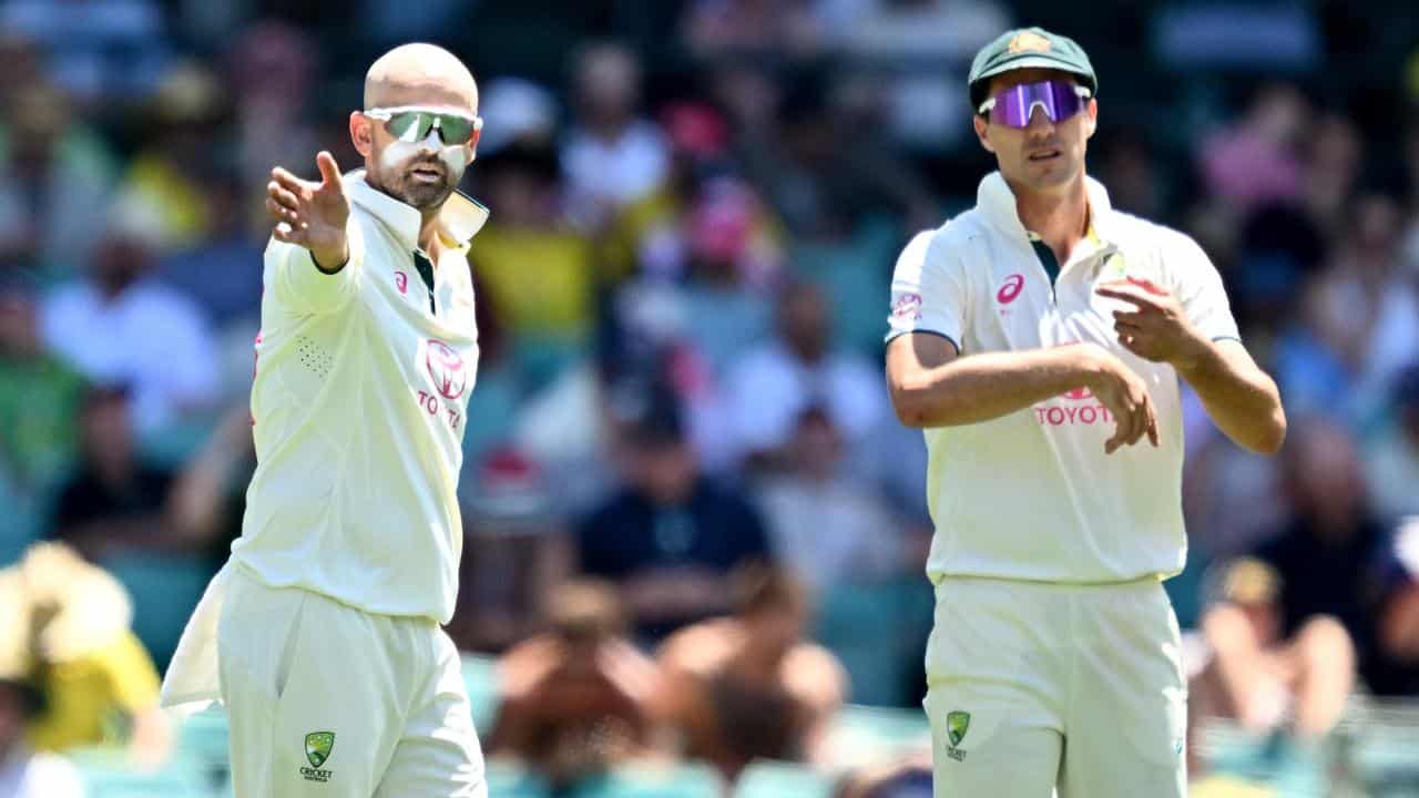 Nathan Lyon and Pat Cummins.