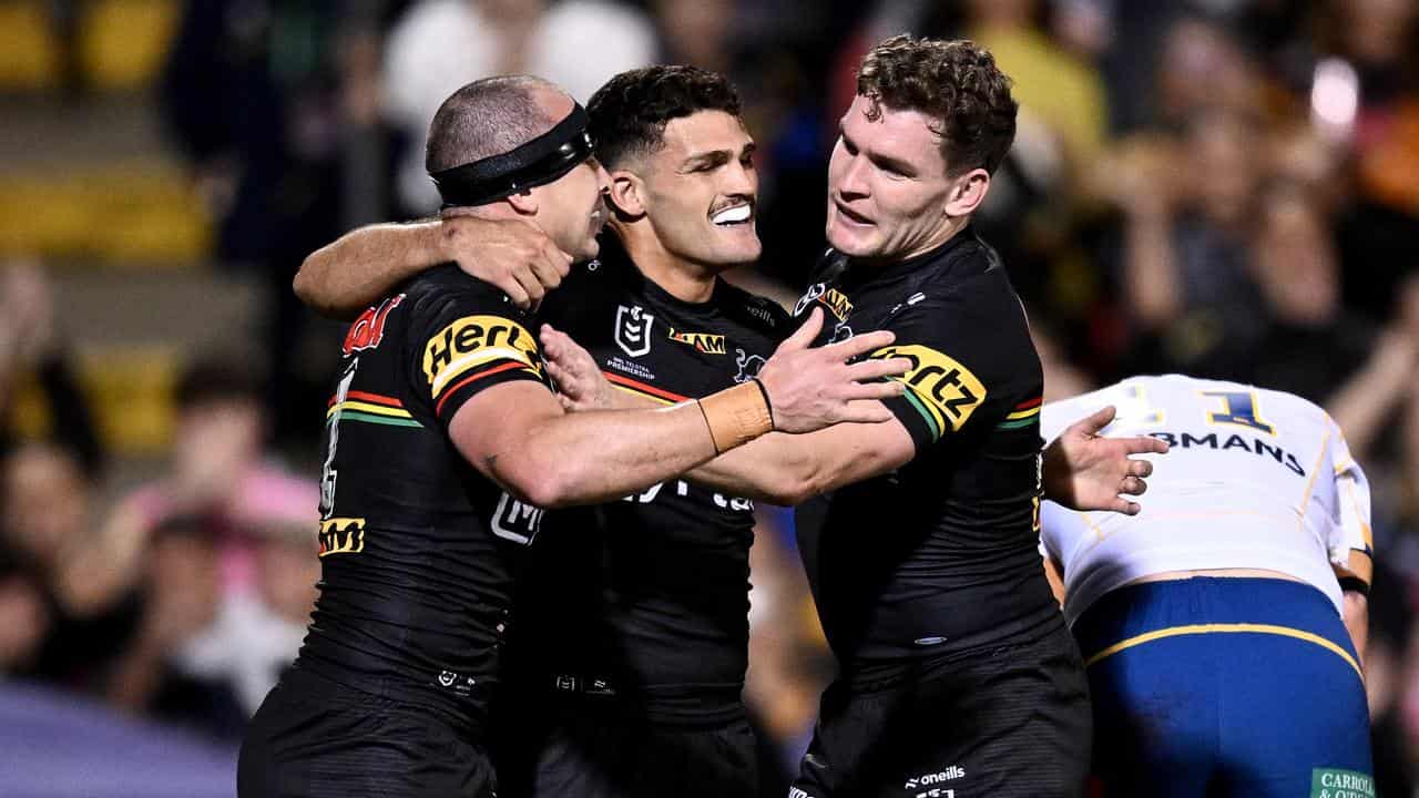 Dylan Edwards, Nathan Cleary and Liam Martin celebrate a try.