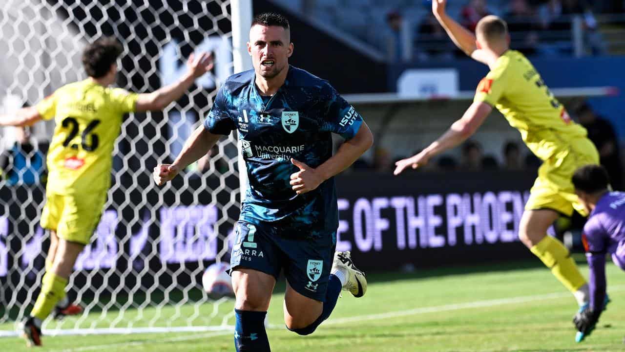 Robert Mak turns away after scoring for Sydney FC v Wellington.